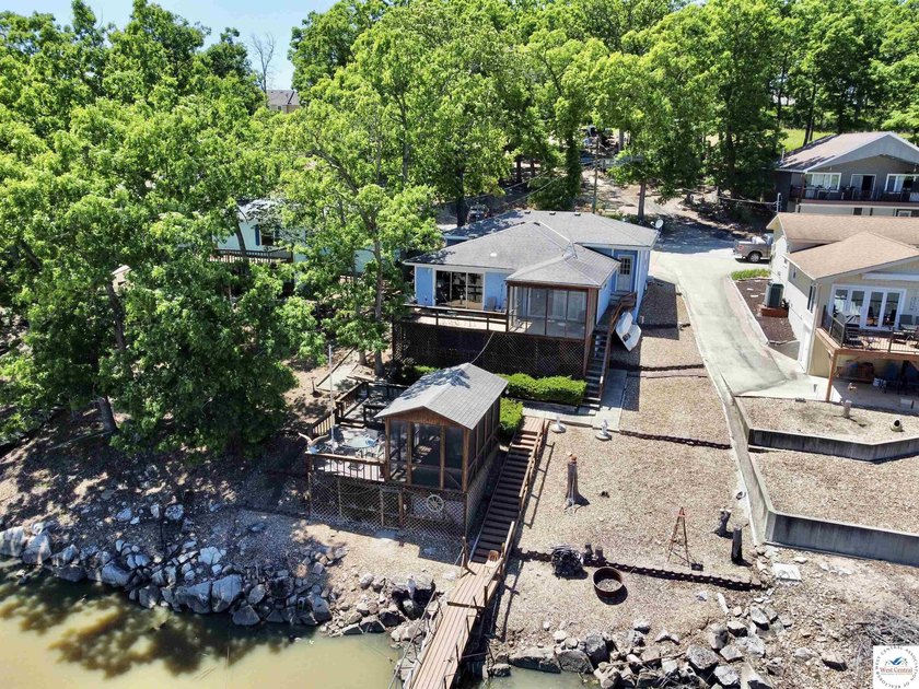 Located on a quiet cove on the Lake of the Ozarks in a very - photo 5