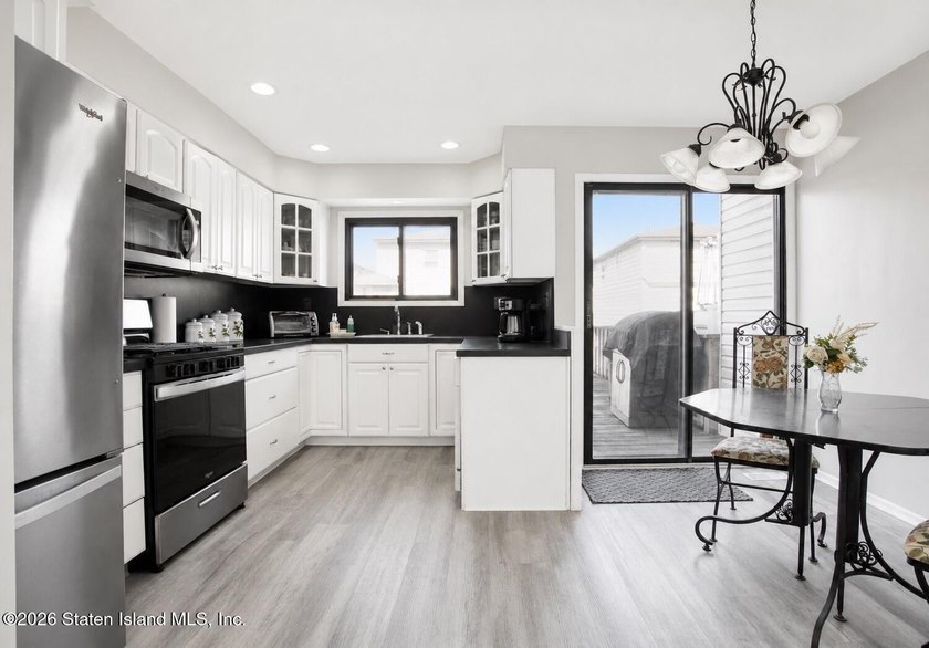 Welcome to this spacious 1-family semi-attached home in the - photo 7