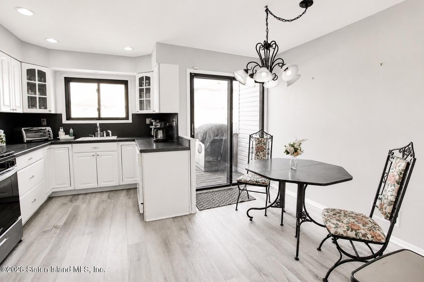 Welcome to this spacious 1-family semi-attached home in the - photo 9