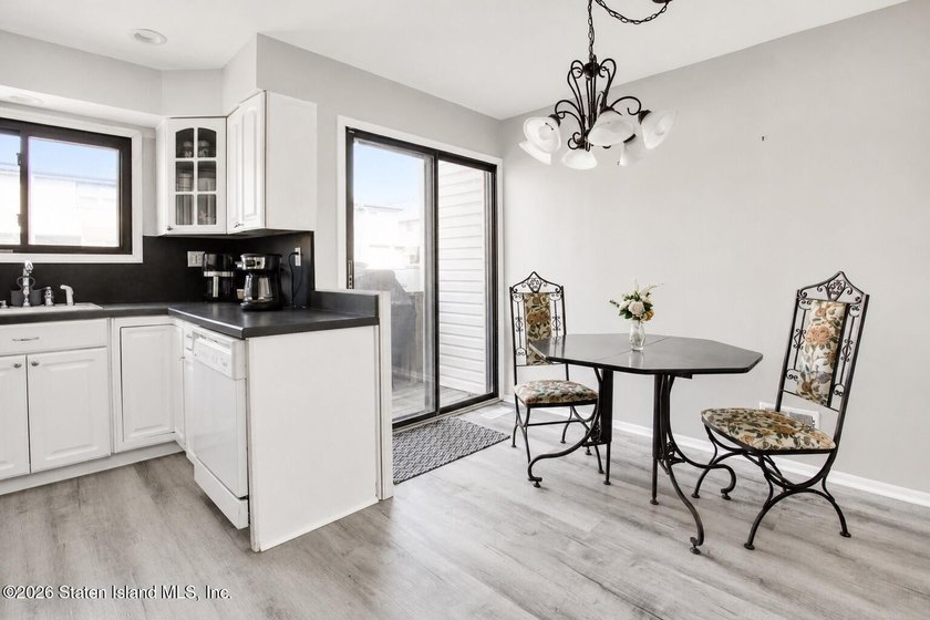 Welcome to this spacious 1-family semi-attached home in the - photo 10