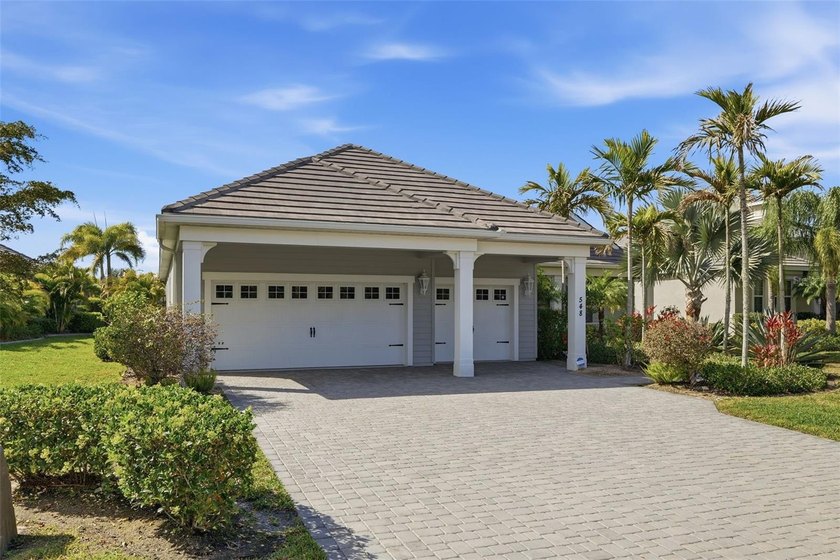 This spectacular Neal Signature home is a boater's dream! Built - photo 2