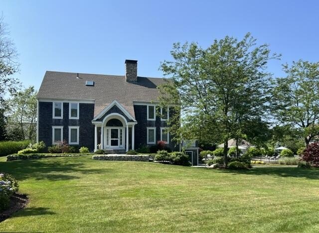 Experience luxury coastal living in this stunning 4-bedroom/ - photo 3