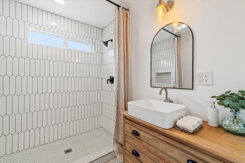 Coastal charm meets modern comfort in this beautifully renovated - photo 11