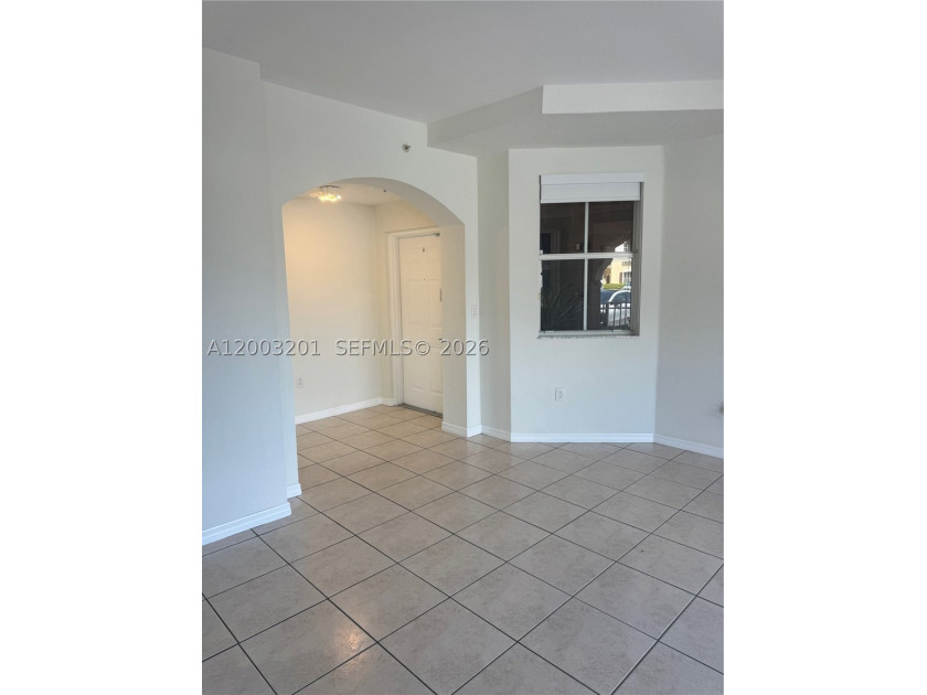 Step into this spacious 3-bedroom , 2 bath first-floor condo - photo 4