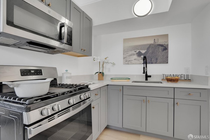 This well-maintained triplex presents a rare opportunity to own - photo 4