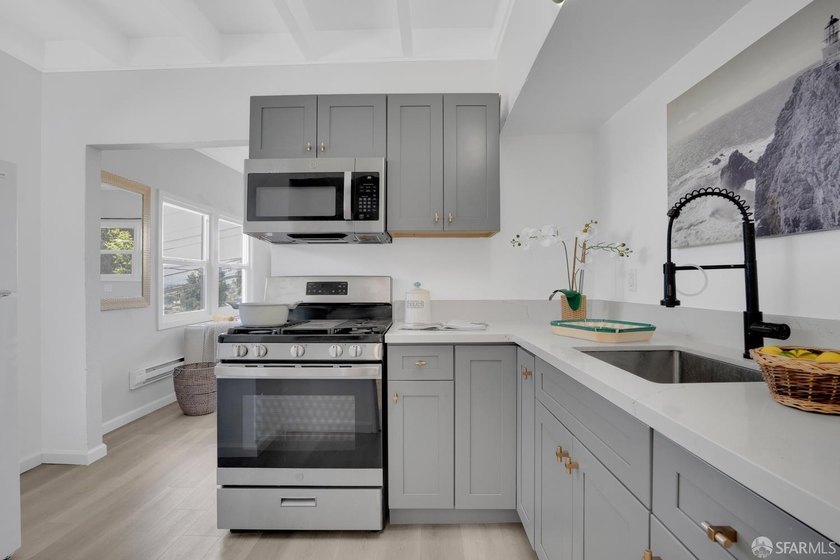 This well-maintained triplex presents a rare opportunity to own - photo 5