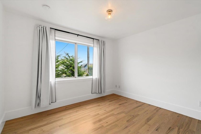 Coastal charm meets modern comfort in this beautifully renovated - photo 18