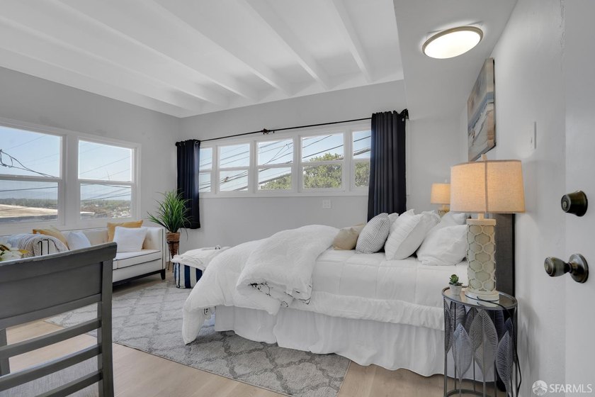 This well-maintained triplex presents a rare opportunity to own - photo 9