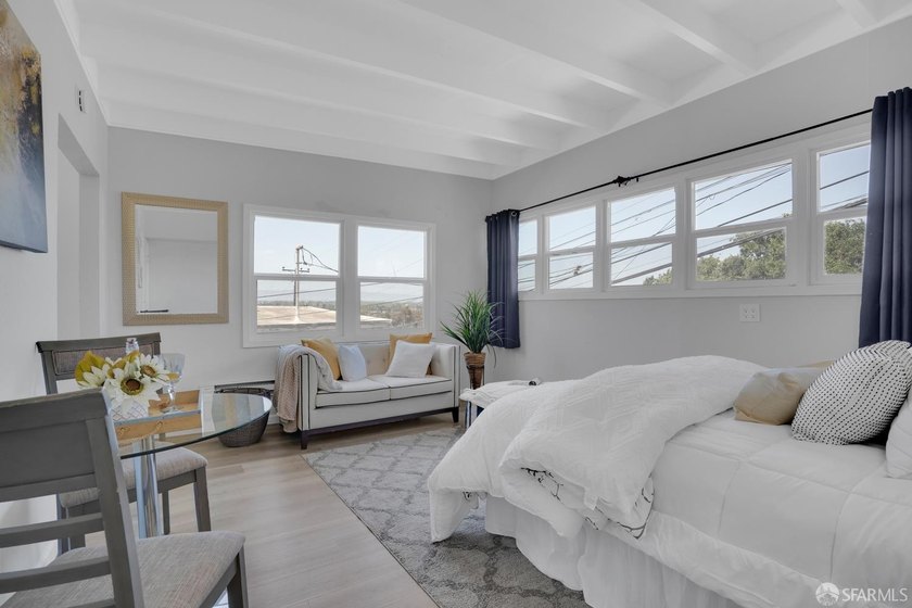 This well-maintained triplex presents a rare opportunity to own - photo 10