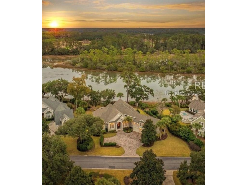Tranquil waterfront views set the tone for this custom H2-built - photo 2