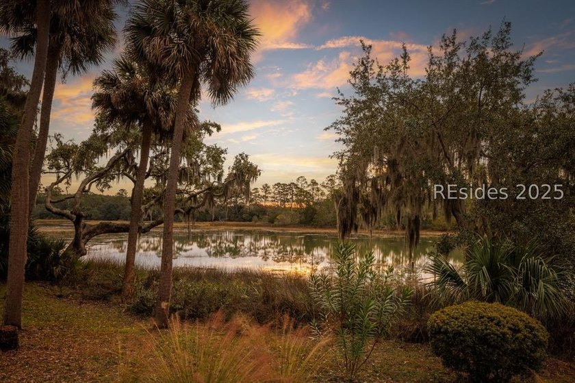 Tranquil waterfront views set the tone for this custom H2-built - photo 6