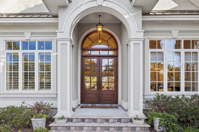 Tranquil waterfront views set the tone for this custom H2-built - photo 9