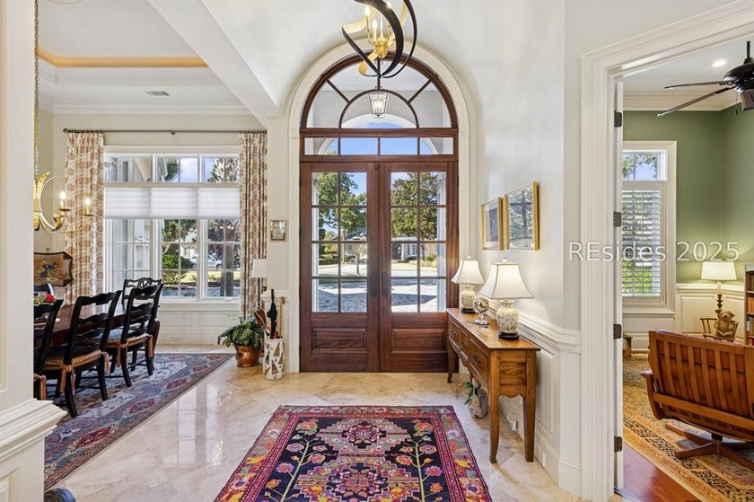 Tranquil waterfront views set the tone for this custom H2-built - photo 10