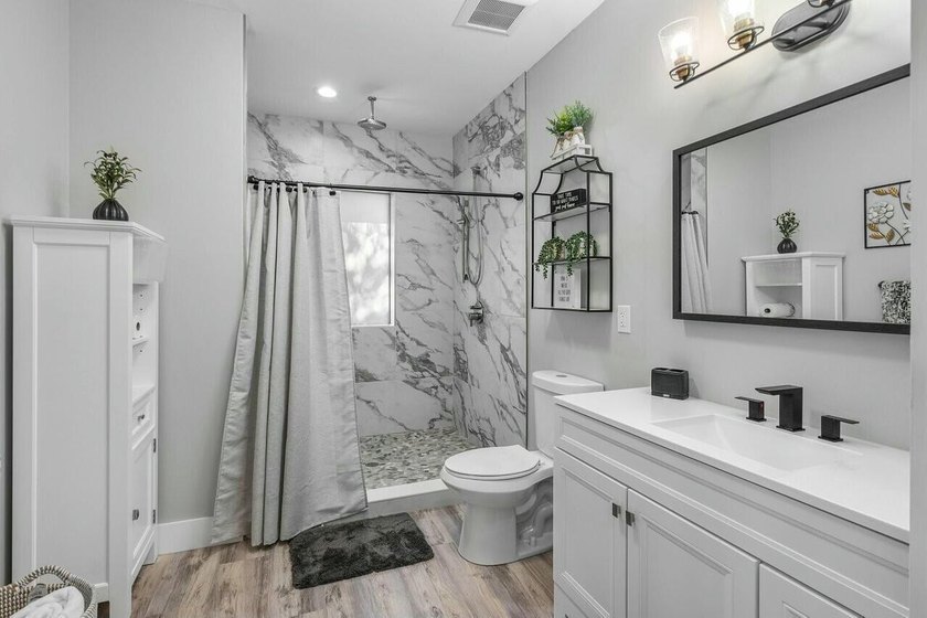 One of Kind 2 Homes, Beautiful treed acre lot in Desirable - photo 49