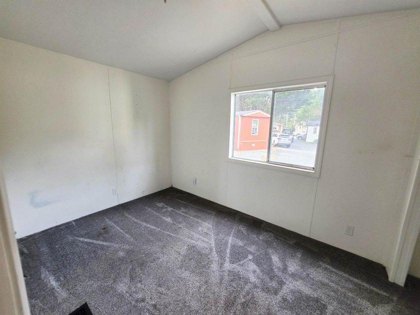 This is a charming, move-in-ready mobile home located in a - photo 11