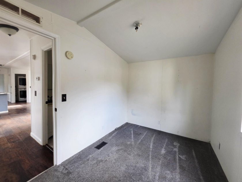 This is a charming, move-in-ready mobile home located in a - photo 12