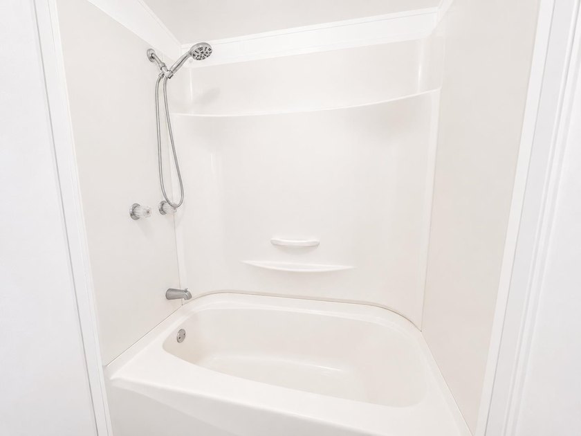 This is a charming, move-in-ready mobile home located in a - photo 14