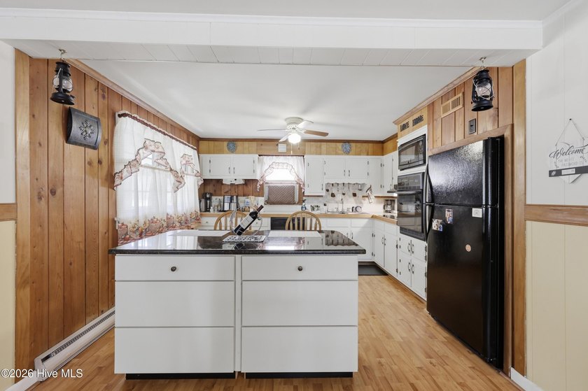 Corner-lot living with space and flexibility! This 3-bedroom - photo 14