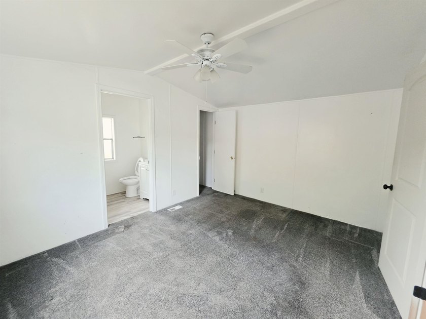 This is a charming, move-in-ready mobile home located in a - photo 16