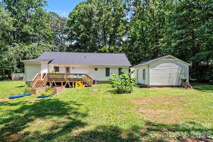 Tucked away on a quiet, tree-lined cul-de-sac, this charming - photo 4