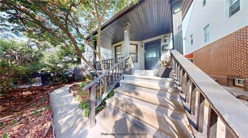Fully renovated in 2020, this detached single-family home offers - photo 2