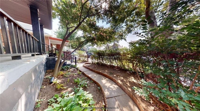Fully renovated in 2020, this detached single-family home offers - photo 3