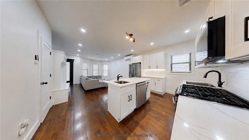 Fully renovated in 2020, this detached single-family home offers - photo 9