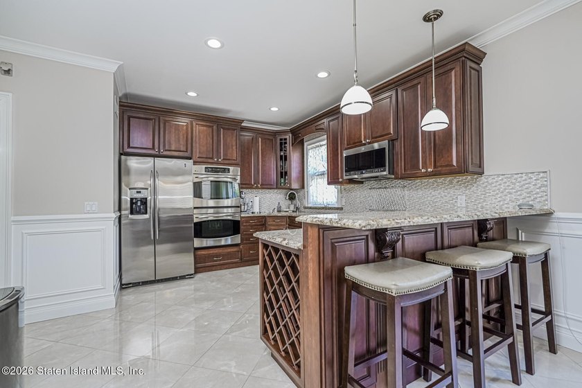 Welcome to 1 McClean Avenue, a beautifully renovated - photo 3