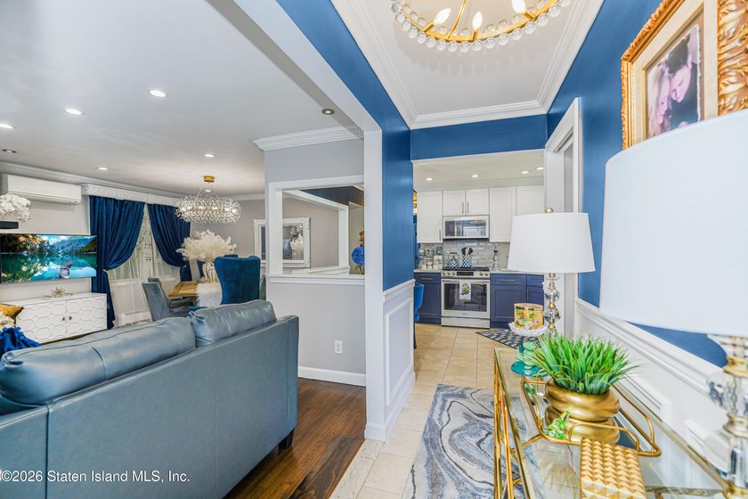 Welcome to 103 Cedar Avenue, a beautifully renovated raised - photo 5