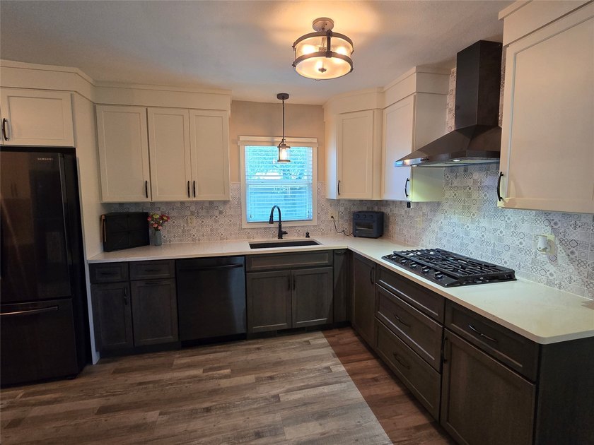 Beautifully updated and thoughtfully maintained, this three - photo 9
