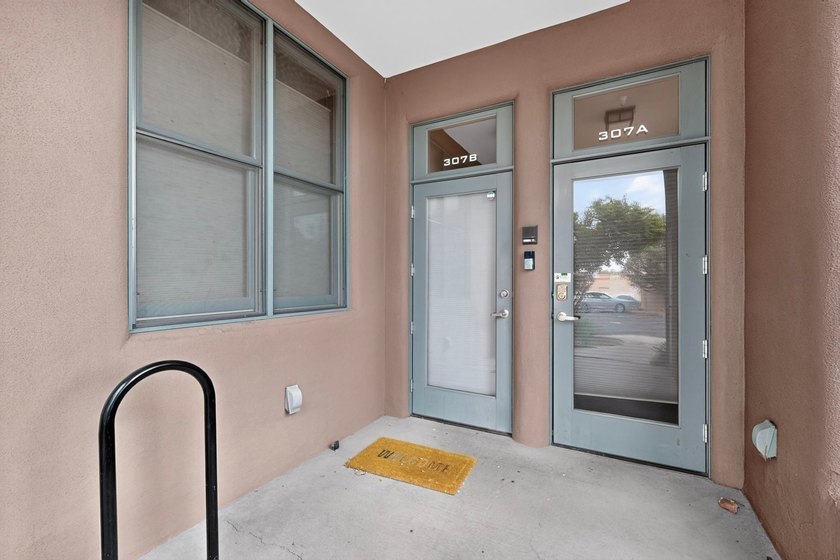 Great live/work condominium unit located in the front of The - photo 2