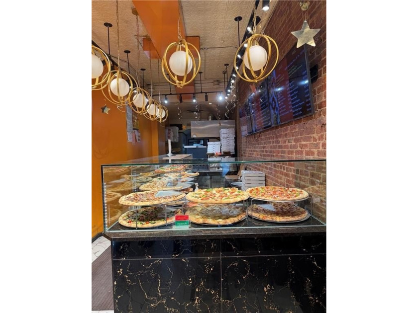 Exceptional opportunity to acquire a fully equipped pizzeria in - photo 4