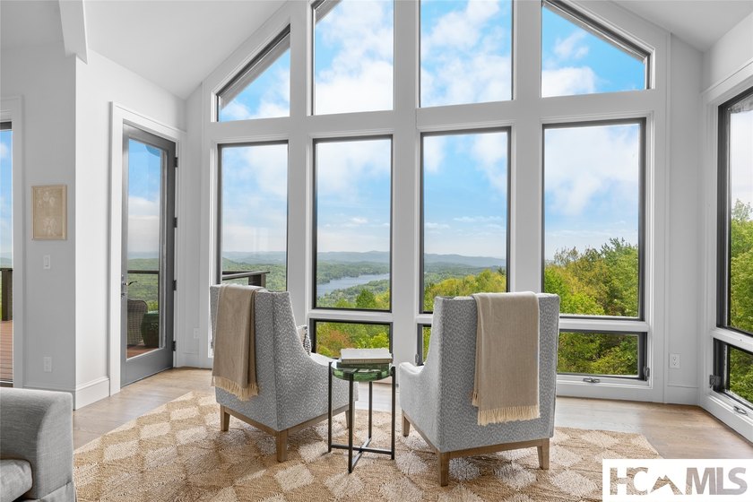 Perched within a quiet cul-de-sac in Lake Toxaway Estates, this - photo 9