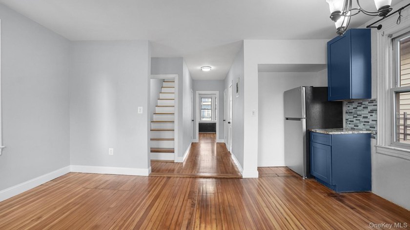 Presenting a beautifully renovated four-level, two-family - photo 13