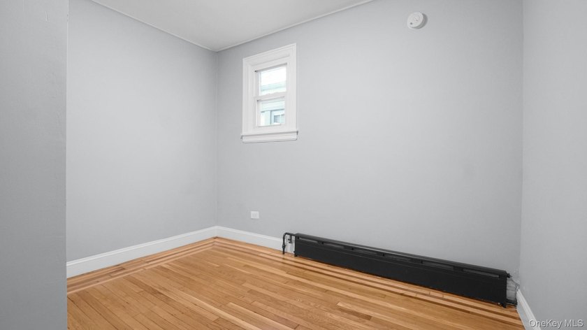 Presenting a beautifully renovated four-level, two-family - photo 15
