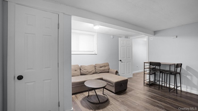 Presenting a beautifully renovated four-level, two-family - photo 20