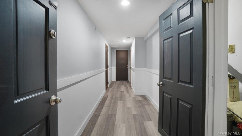 Presenting a beautifully renovated four-level, two-family - photo 21