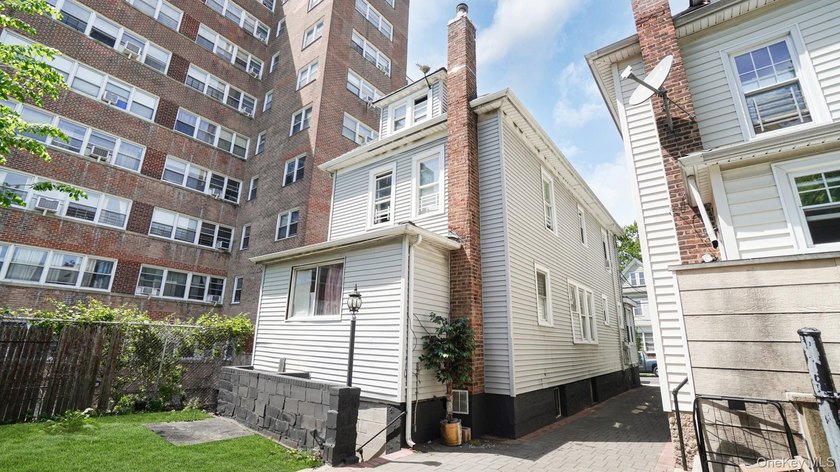 Presenting a beautifully renovated four-level, two-family - photo 24