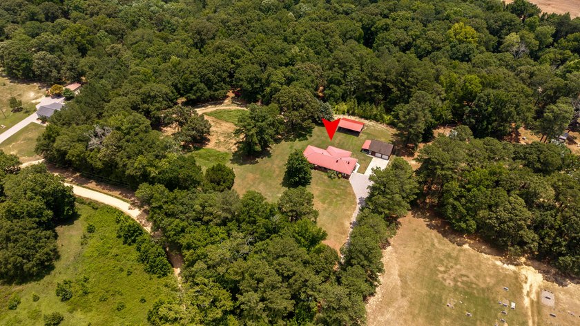 Enjoy country living on this 10-acre property with two homes - photo 2