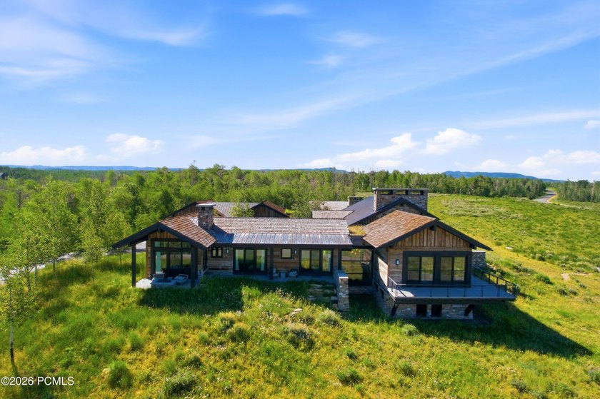 Set on 160 private acres in the heart of Wolf Creek Ranch, this - photo 3