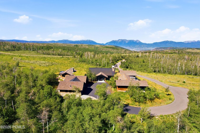 Set on 160 private acres in the heart of Wolf Creek Ranch, this - photo 7