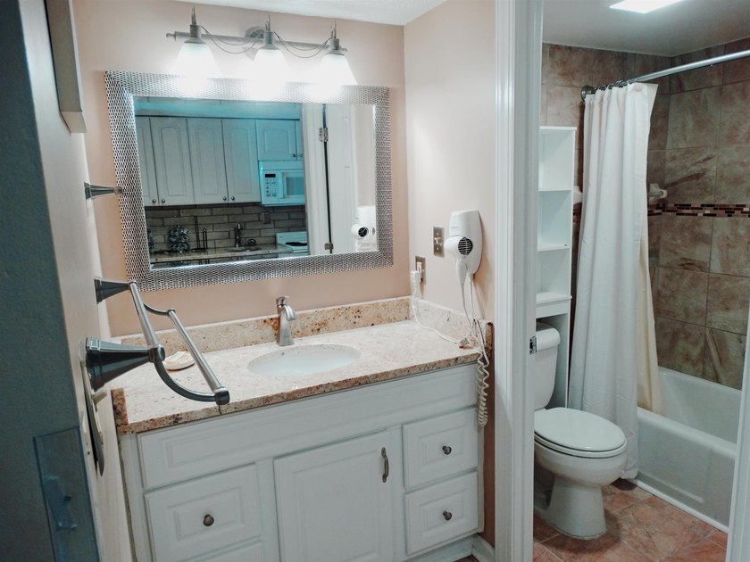 Enjoy coastal living from this ocean view 1-bedroom, 1-bath - photo 8