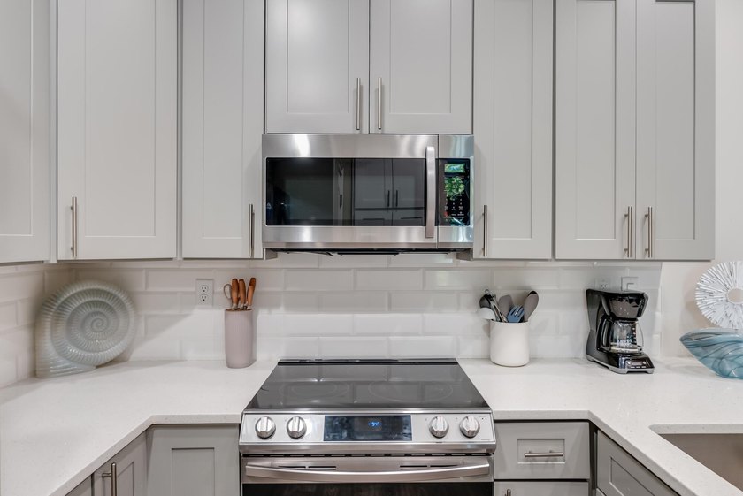 Motivated Seller! Experience refined coastal living in this - photo 9