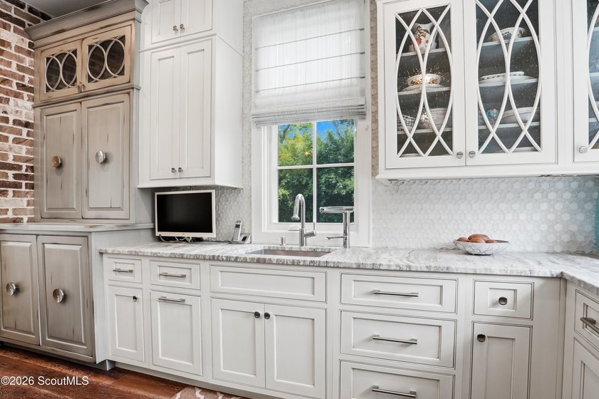 Experience unparalleled luxury in this exceptional island home - photo 17
