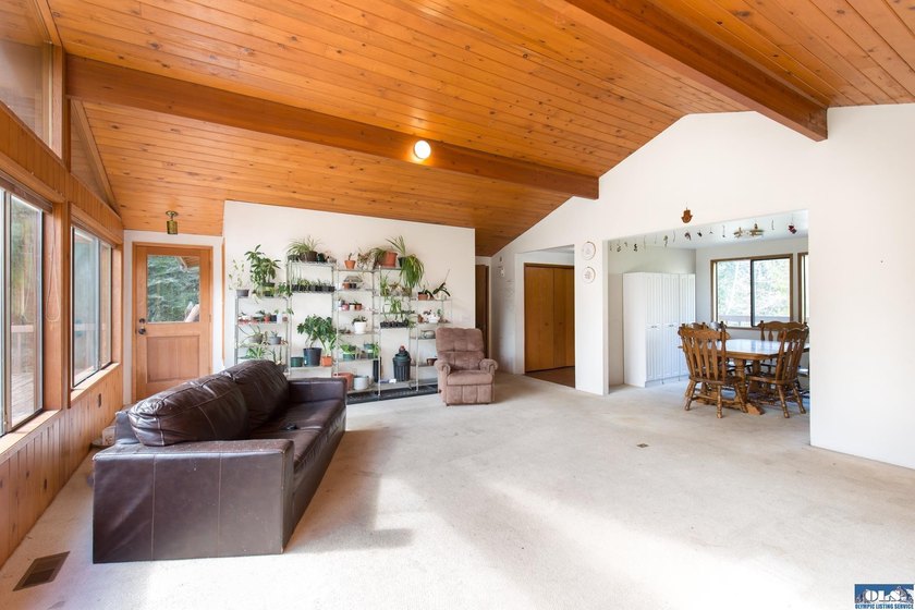Nestled on 5 private acres in Sequim, this stunning 3 - photo 11