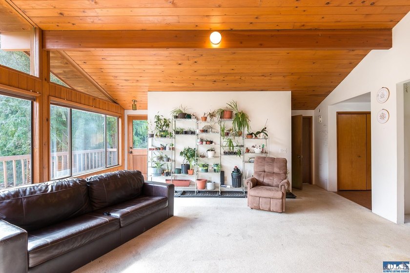 Nestled on 5 private acres in Sequim, this stunning 3 - photo 12