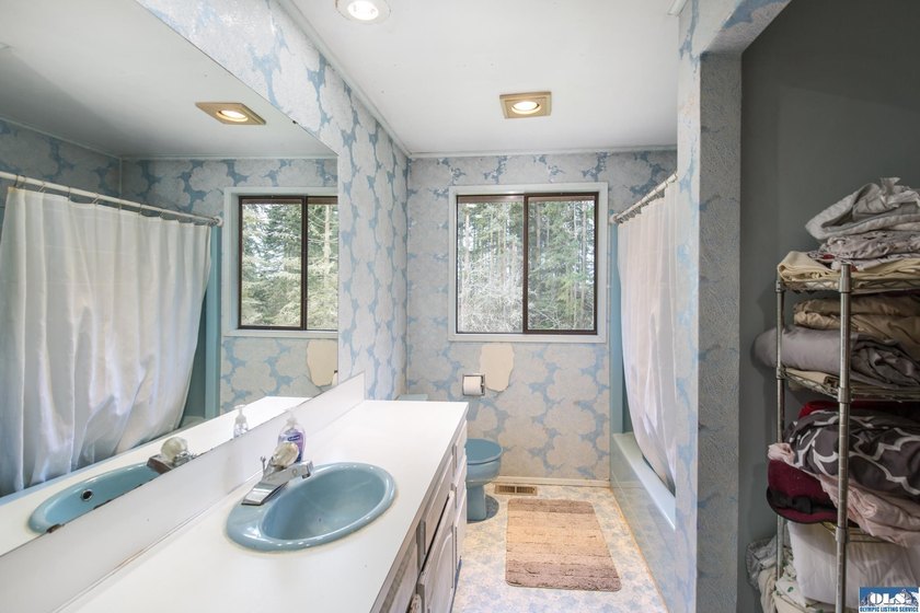Nestled on 5 private acres in Sequim, this stunning 3 - photo 19
