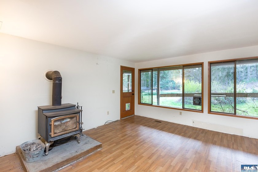 Nestled on 5 private acres in Sequim, this stunning 3 - photo 21
