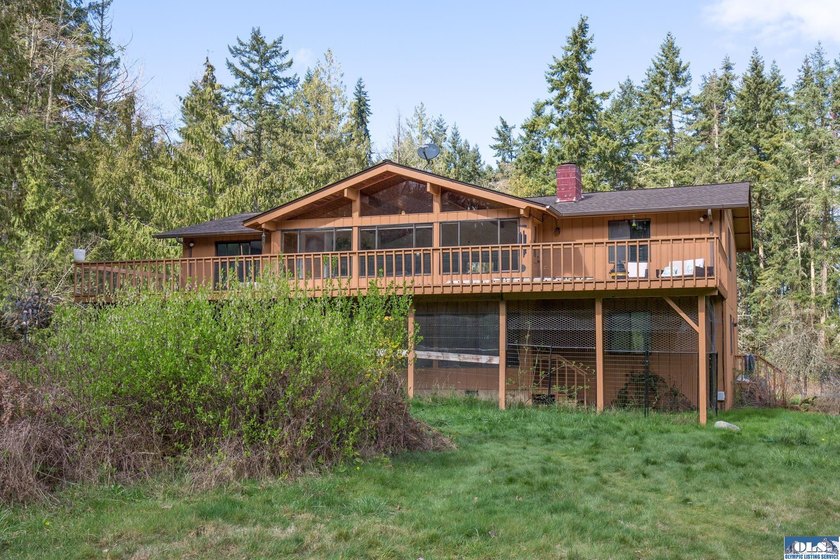 Nestled on 5 private acres in Sequim, this stunning 3 - photo 32