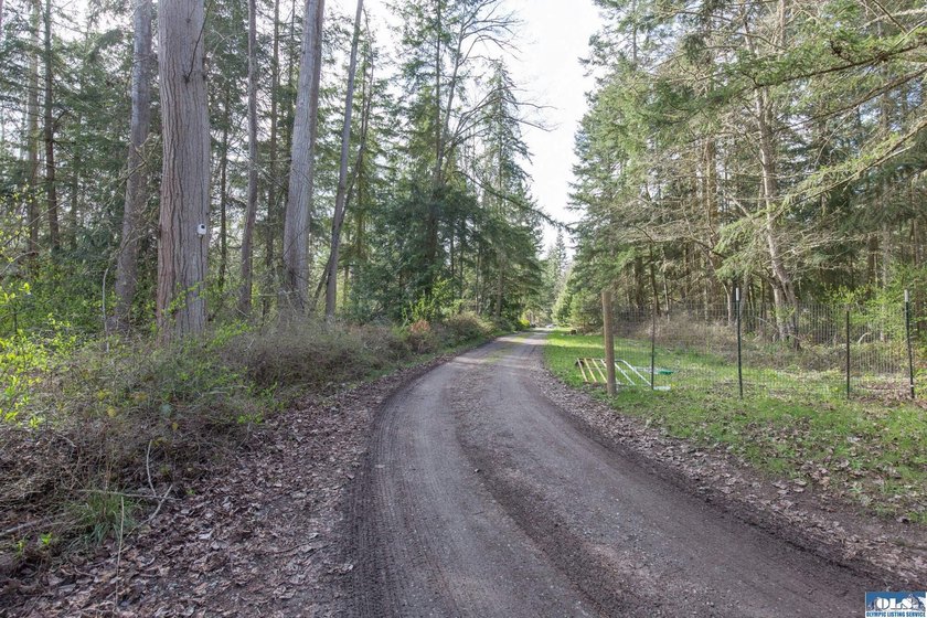 Nestled on 5 private acres in Sequim, this stunning 3 - photo 40